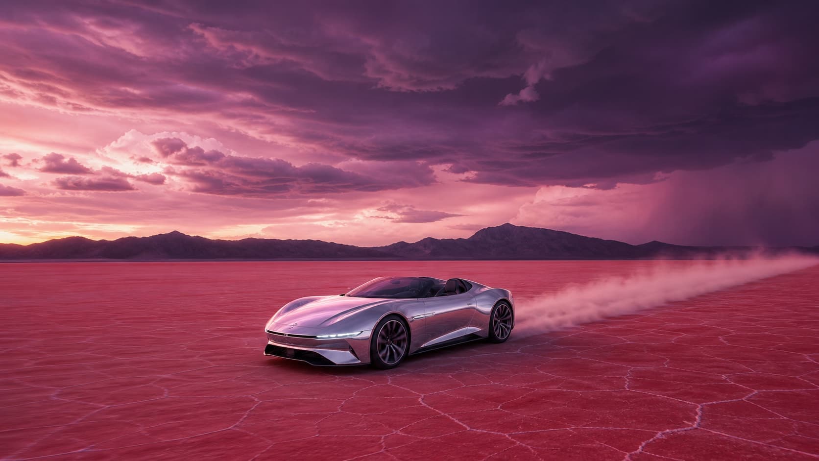 A mirror-chrome concept roadster crossing a rose-red salt desert